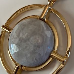 Gold necklace with gray marble